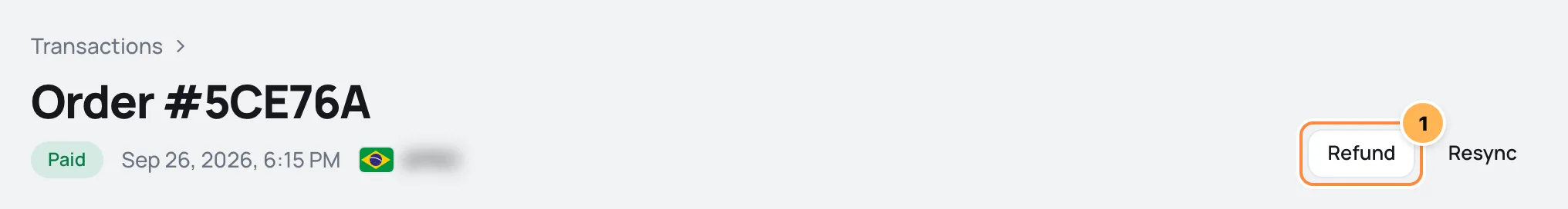 Top of a paid order's page with the Refund button highlighted